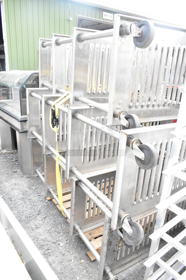 Three 4-tier metal shelving units on commercial casters. Durable, dismantling required. Note: Freight charges apply.