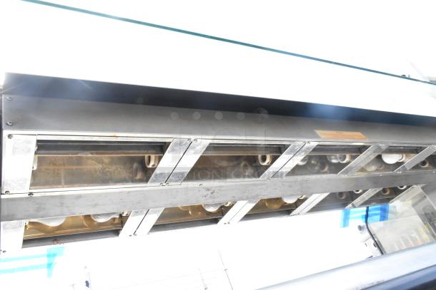 Henny Penny HMI-105 HI-5 heated display case, stainless steel, 120/208V, 1 phase, commercial use, visible wear.