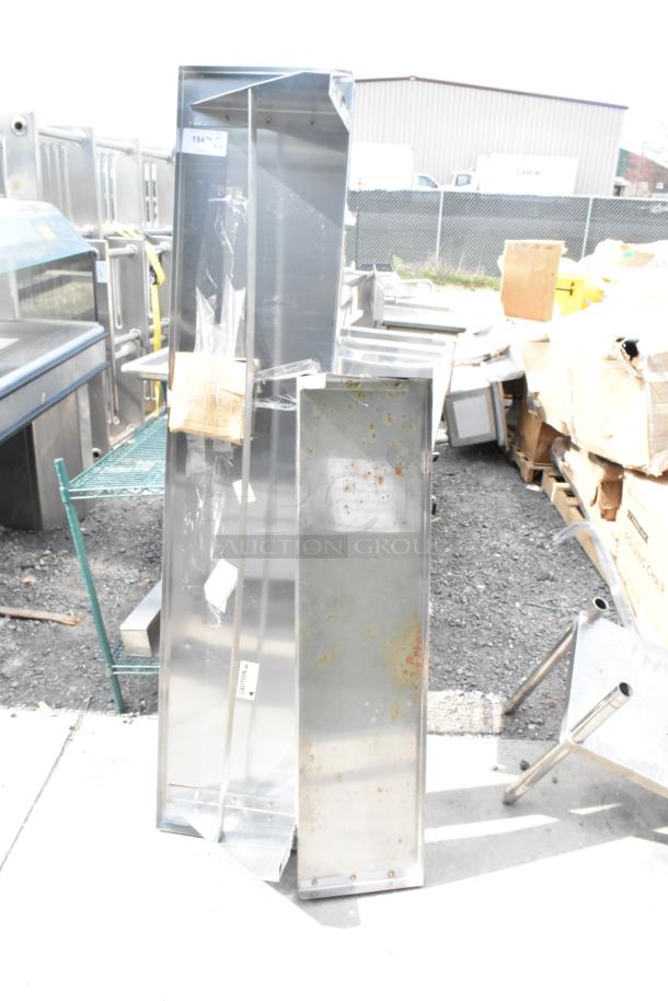 Two Regency wall mount shelves, models 600PS1572 and 600WS1248HD, shown with metal finish and some rust spots.