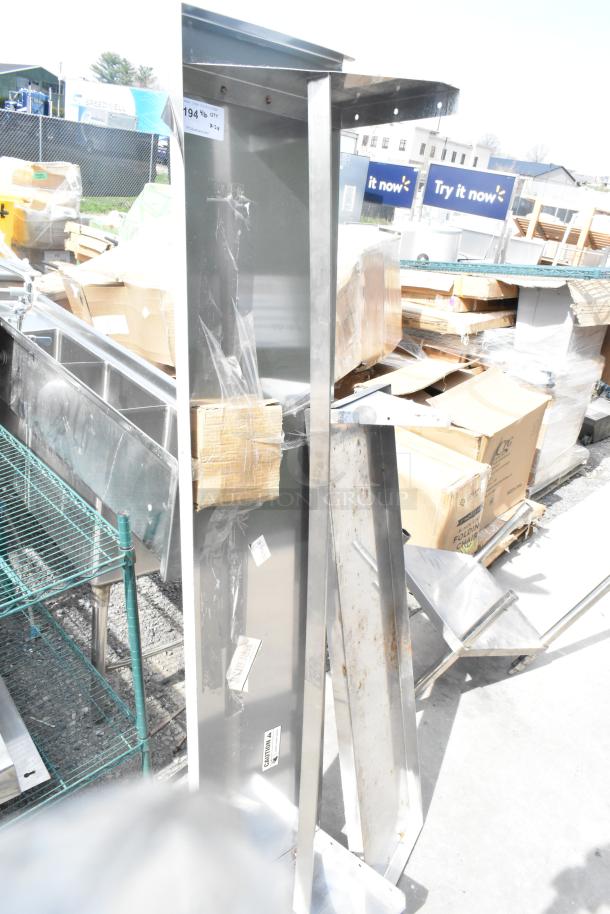 2 Regency wall mount shelves, models 600PS1572 and 600WS1248HD, new condition, stainless steel construction.