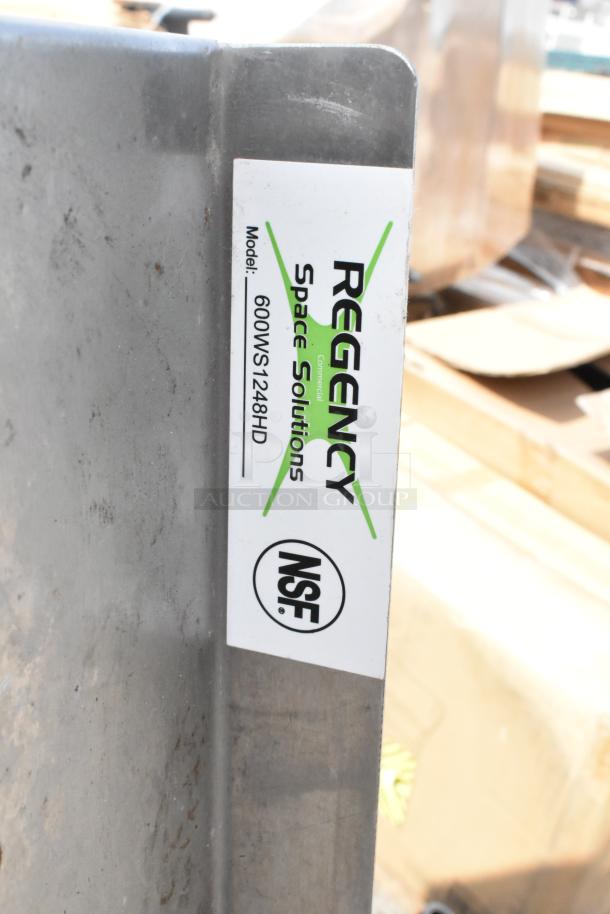 Regency wall mount shelf, model 600WS1248HD. Durable metal with visible NSF label, scratches present.