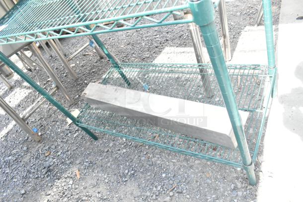 Green finish 2-tier wire shelving unit, durable metal, requires dismantling for buyer shipping, freight applicable.