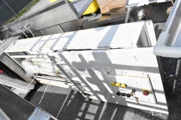 Industrial control panel with buttons and key switches, white metal, slight rust, label reading "197" visible, fair condition.