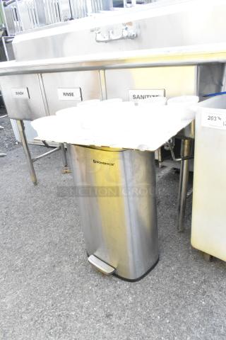 Songmics trash can with foot pedal, stainless steel, next to a tray. Bid doubles the value. Markings indicate PC Auctions.