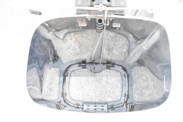 Songmics trash can interior, metal frame and lever mechanism, reflective surface, gently used condition.