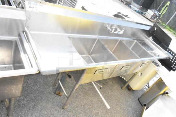 Commercial 3 bay sink with dual drain boards, stainless steel, includes labeled wash, rinse, sanitize sections, used condition.