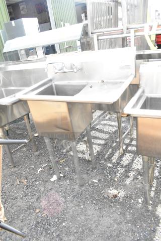 Commercial single bay sink with right side drain board, stainless steel, good condition, sturdy legs, faucet included.