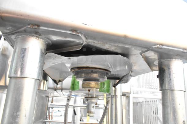 Commercial single bay sink with right side drain board, stainless steel, sturdy construction, moderate wear.