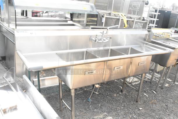 Commercial 3-bay sink with dual drain boards, stainless steel, labeled "Wash," "Rinse," "Sanitize," includes faucet.