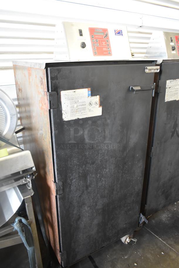 Cookshack 250 commercial electric smoker cabinet with control panel, visible markings, on commercial casters, 208 volts.