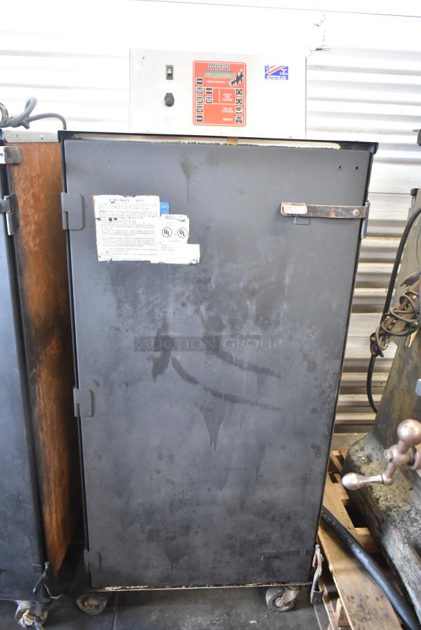 Cookshack 250 Commercial Electric Smoker Cabinet, 208V, on casters. Features control panel and caution labels.
