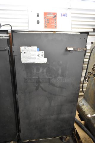 Cookshack 250 Commercial Electric Powered Smoker Cabinet on Commercial Casters. 208 Volts.