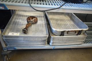 31 Various Items Including Full Size Baking Pans and Roasting Pan. 31 Times Your Bid!