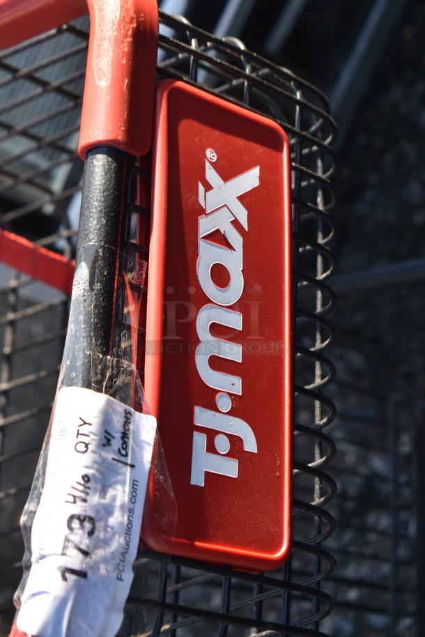 2-tier shopping cart with T.J.Maxx branding, featuring black and red design. Visible label indicates auction details.