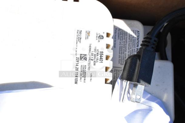 2 Little Giant VCMA-15 condensate removal pumps, model 554401, 115V, 60Hz, thermally protected, black power cord visible.