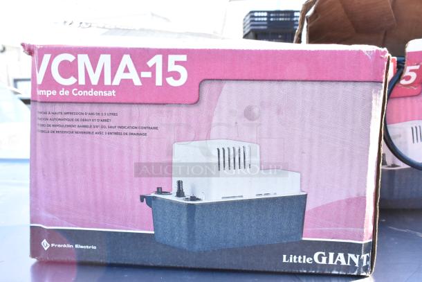 Two Little Giant VCMA-15 Condensate Removal Pumps in original packaging, features automatic operation, new condition.