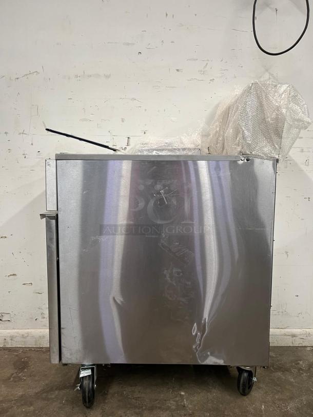 Brand new Atosa ATFS-50 CookRite 50 lb heavy-duty gas fryer with 4 burners. Wrapped and ready for use, on casters for mobility.