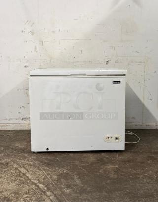 MAGIC CHEF deep freezer in white, used condition with minor dents. Features temperature control. Model: DEEP FREEZER.