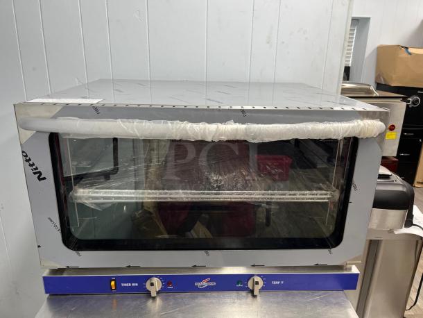 ROCKET ENCOV-38 countertop convection oven, full size, glass door, 208/204V, new condition with protective wrapping.