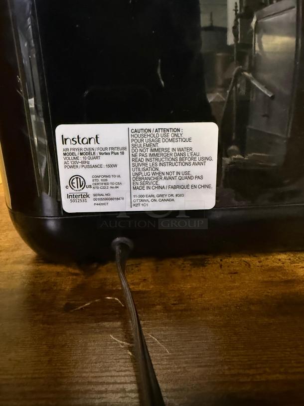 Instant Pot Vortex Plus 10 Quart Air Fryer Oven showing model label and power cord. 1500W, made in China.