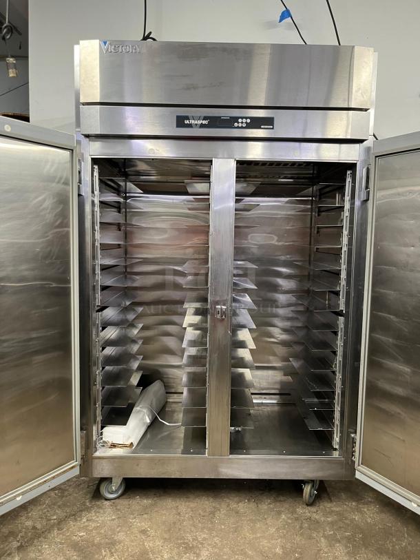 VICTORY ULTRASPEC roll-thru refrigerator, double solid doors, stainless steel, excellent condition, model UTRASPEC.