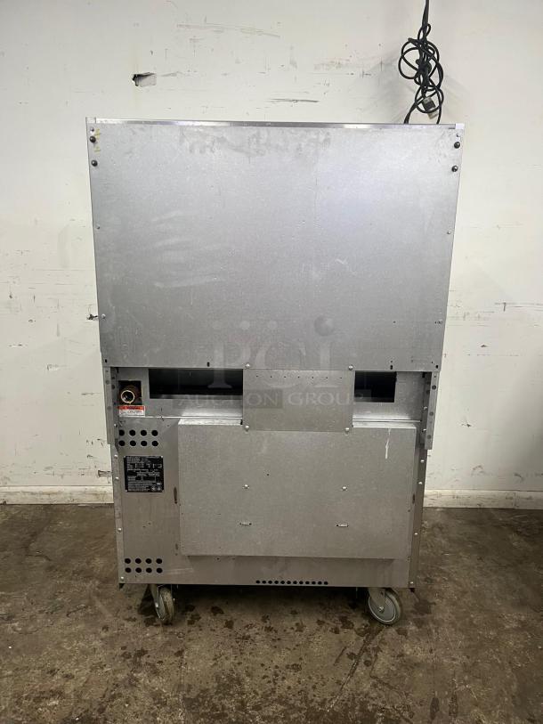 Back view of VULCAN 36" 6 Burner Gas Range, Model 36S-6B, with wheels and visible labels. Used condition.