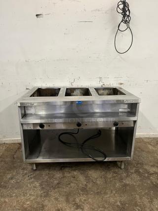 RANDELL 3513-120 48" electric hot food table with three top openings, stainless steel, visible wiring, fair condition.