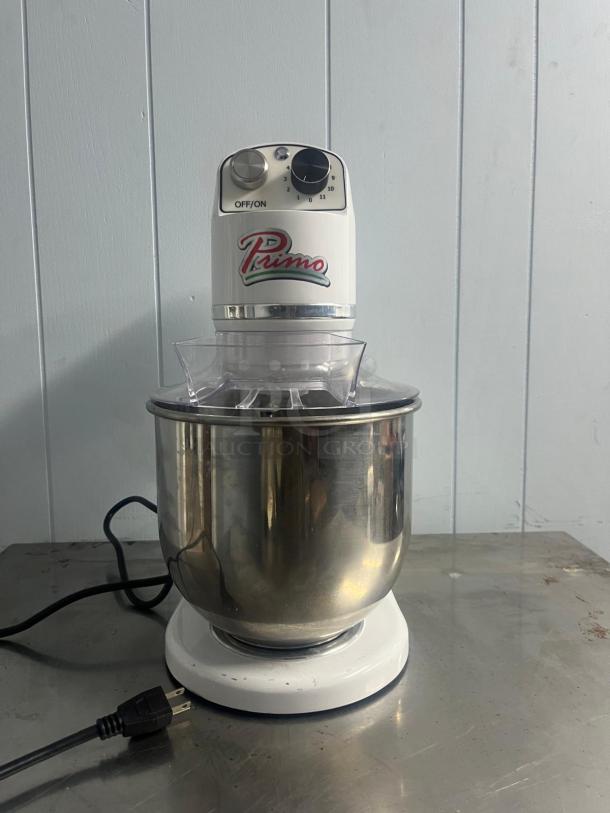 PRIMO PM-7 commercial planetary mixer, 7-quart, stainless steel bowl, adjustable speed dial, visible power cord, good condition.
