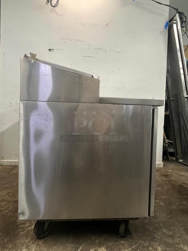 RANDELL 8268N 68" refrigerated pizza prep table, stainless steel, 2-section, 2 doors, 17.76 cu. ft., on wheels.