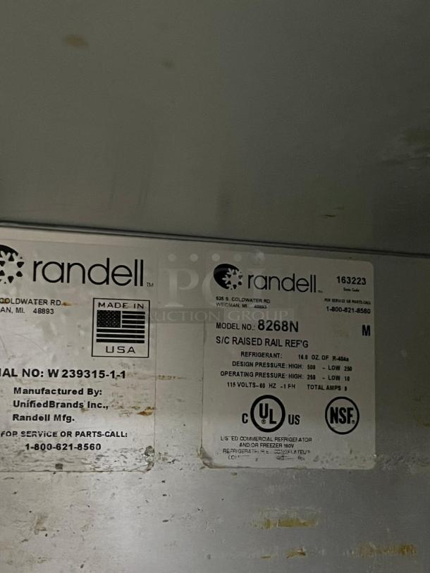 Randell 8268N-290-PCB refrigerated pizza prep table label showing model, refrigerant details, and certifications.