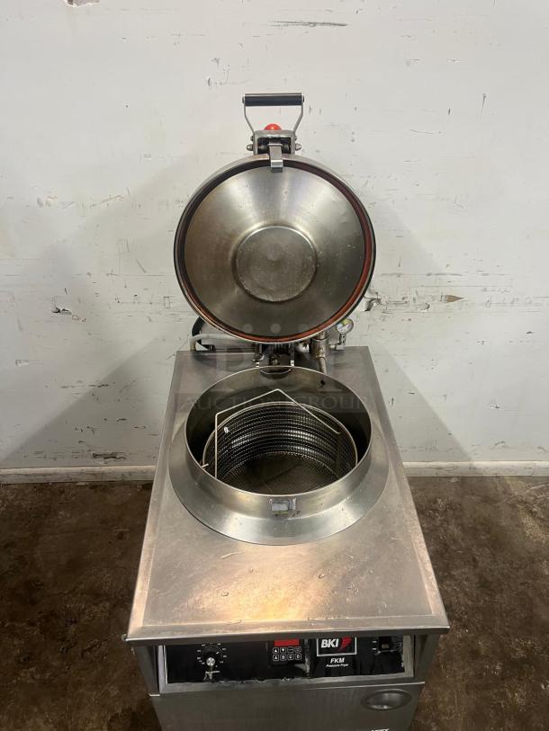 BKI FKM-F 24 inch electric pressure fryer with manual control, extra large volume. Stainless steel, open lid view, control panel visible.