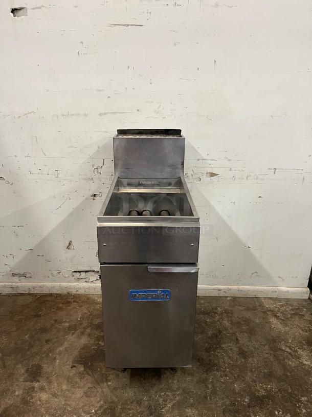 IMPERIAL IFS-40 floor model gas fryer, 40lb capacity, 105,000 BTU. Stainless steel, excellent condition. Front view showing brand logo.