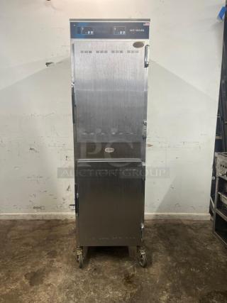 ALTO-SHAAM 1000-UP full height insulated mobile heated cabinet, holds 8 pans, stainless steel, 120V, on casters.