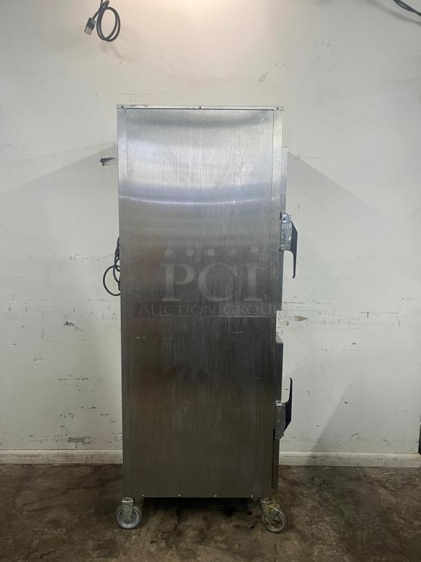 ALTO-SHAAM 1000-UP Halo Heat mobile heated cabinet, stainless steel, full height, eight-pan capacity, on casters.