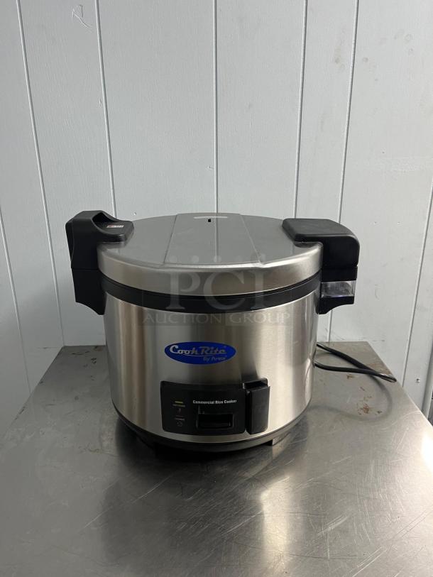Brand new CookRite SRC-60H rice cooker/warmer with rice paddle holder. Stainless steel, 120V, commercial use.