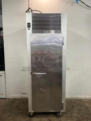 Traulsen G10010 30" reach-in refrigerator with solid right hinged door, stainless steel, on casters, good condition.