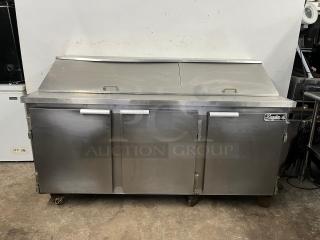 LEADER NSFM72 72" 3-door refrigerated prep table, stainless steel, good condition, brand label visible.