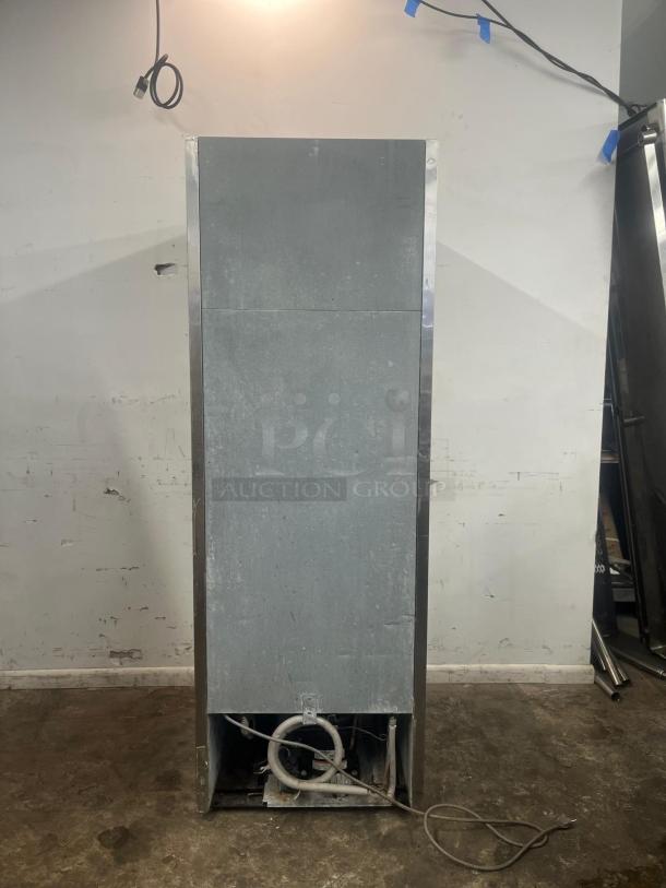 TURBO AIR TSF-23SD-N Super Deluxe 27" solid door reach-in freezer, rear view, showing wiring and back panel.