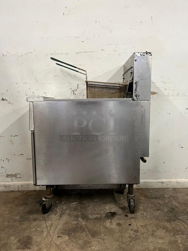 PITCO SG14-S-NG Solstice stainless steel floor fryer, 40-50 lb. capacity, natural gas, 110,000 BTU, good condition.