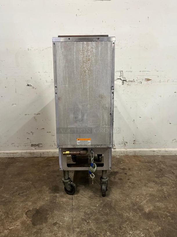 PITCO SG14-S-NG Solstice gas fryer, stainless steel, 40-50 lb capacity, 110,000 BTU, on wheels, used condition.