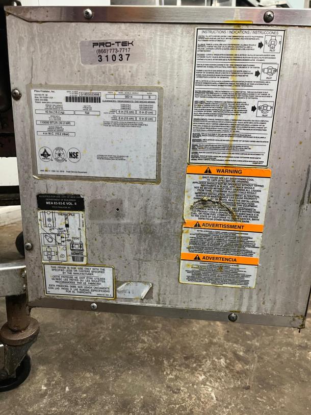 PITCO SG14-S-NG Solstice Natural Gas Floor Fryer, stainless steel, 40-50 lb capacity, 110,000 BTU, visible warning labels.