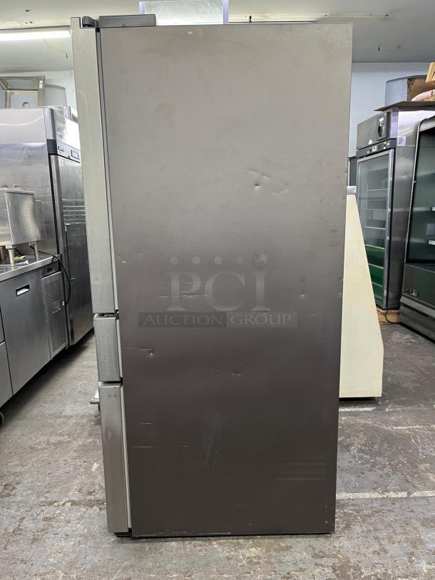 Samsung 36" French Door Refrigerator RF28R7201SR, new open box, sleek finish, visible side view, minor surface marks.