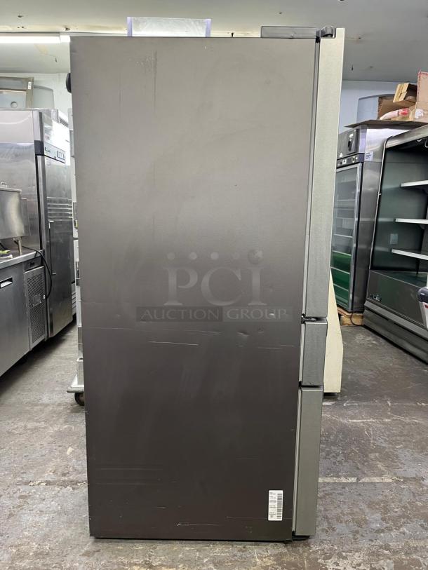 Brand new Samsung 36" French Door Refrigerator RF28R7201SR in open box, sleek design, stainless steel finish.