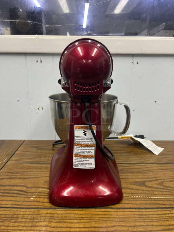 KITCHEN AID Artisan Series 5 Quart Tilt Head Stand Mixer, Empire Red, Model KSM150PS. Appears in good condition, with visible warning label.