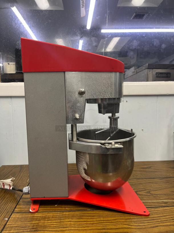 SAMMIC BM-5E planetary mixer with stainless steel bowl, red and gray exterior, showing signs of light use.