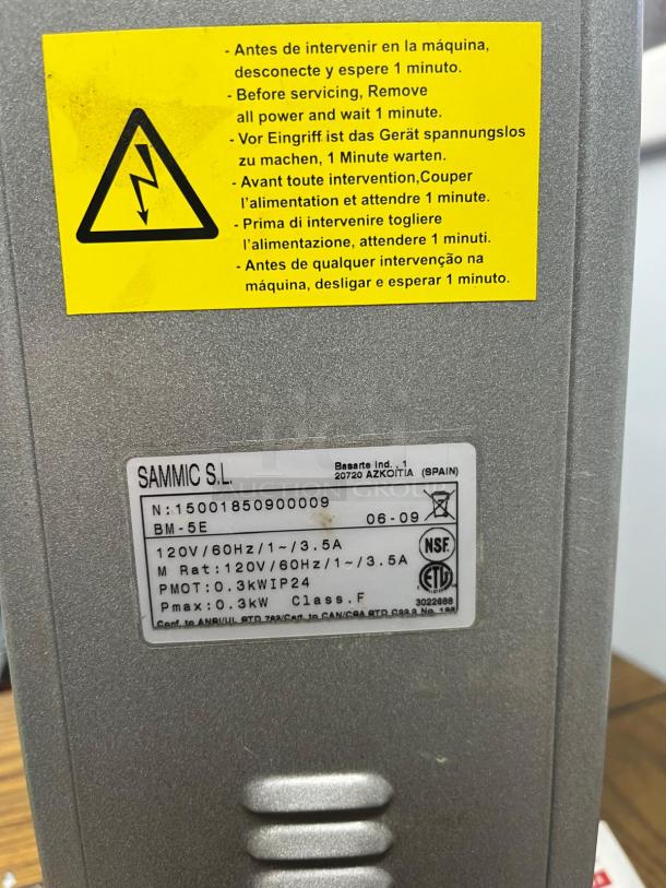 Sammic BM-5E planetary mixer label showing model, power specs, and safety warnings in multiple languages.