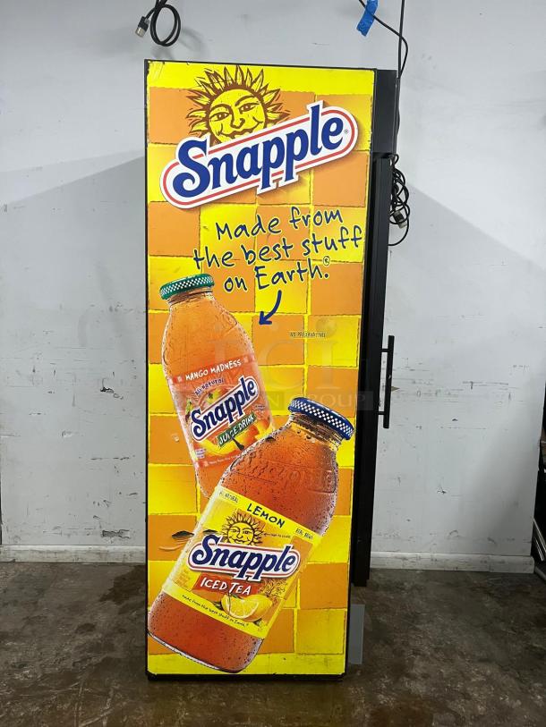 TRUE GDM-26 merchandiser refrigerator with Snapple design, single glass door, vibrant exterior, used condition.