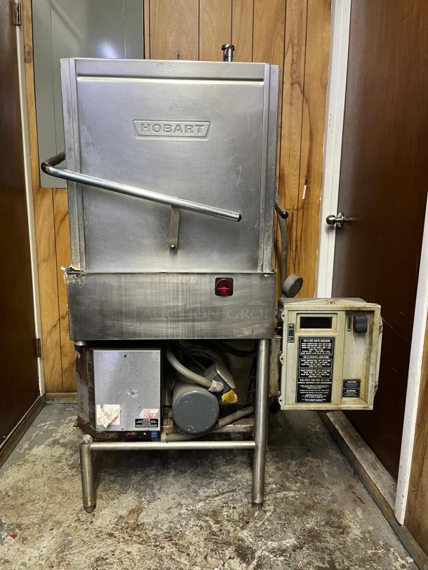 HOBART AM14 commercial dishwasher, stainless steel, used condition, visible control panel, sturdy build, model AM14 label.