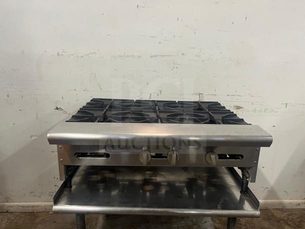American Range ARHP-36-6 heavy-duty griddle with 6 burners, 36" wide, 3/4" thick hot plate, used condition.
