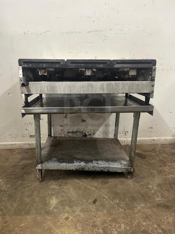 American Range ARHP-36-6 heavy-duty griddle, 36" wide, 6 burners, 3/4" thick hot plate. Some surface wear visible.